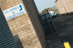 Warehouse Deliveries Sign
